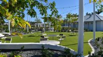 Public seating area with lush landscaping